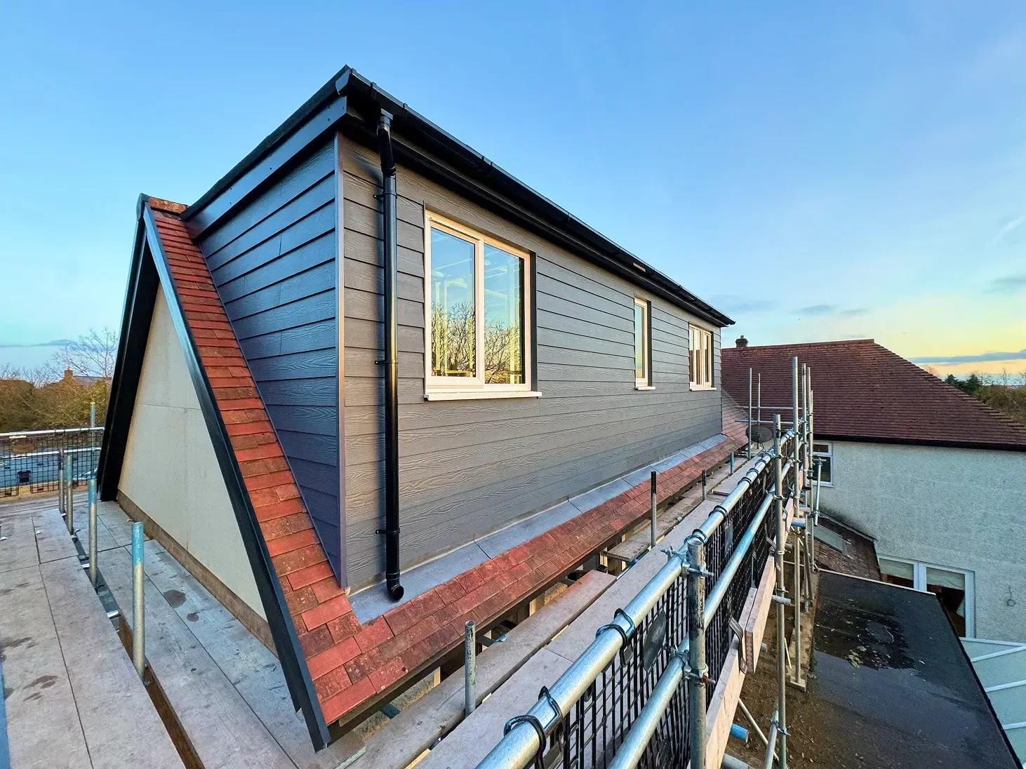 After hip-to-gable dormer loft conversion in Desborough